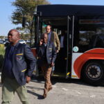 Passengers leaving the bus 14